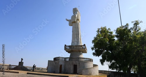 Nicaragua Christ of the Mercy on mountain top. Cultural traditions, diversity in folklore, cuisine and culture. Generally poor population in villages and cities. Market places sell everything. photo