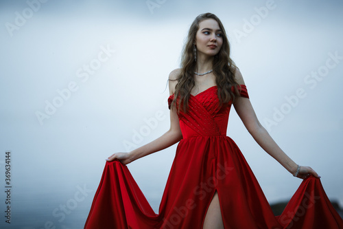 woman in a long red dress. Copycpase