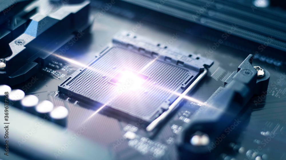Computer motherboard with small parts, components for computer assembly and repair. Tech background, neon light. Close-up. Computer motherboard with small parts, components for computer assembly and repair. Tech background, neon light. Close-up.