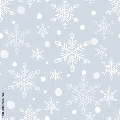 Snowflake seamless pattern. White snow crystals on light blue background. Great for winter fabric, textile, Christmas wrapping paper, scrapbooking. Surface pattern vector design.