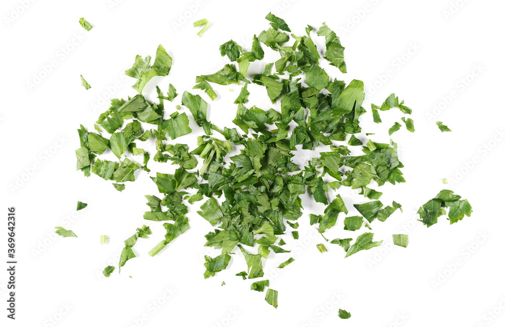 Fresh chopped up celery leaves pile isolated on white background, top view Fresh chopped up celery leaves pile isolated on white background, top view