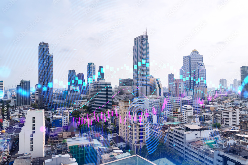 Fototapeta premium Forex and stock market chart hologram over panorama city view of Bangkok, the financial center in Asia. The concept of international trading. Double exposure.