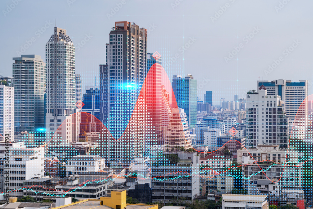 Obraz premium Forex and stock market chart hologram over panorama city view of Bangkok, the financial center in Asia. The concept of international trading. Double exposure.