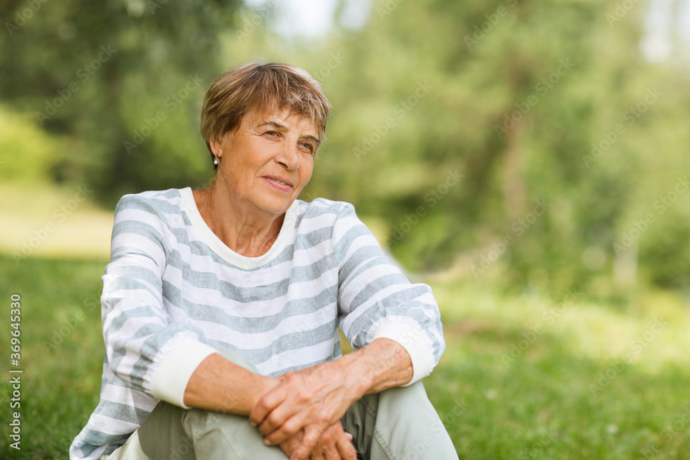 happy Senior caucasian woman relaxed outdoors. copy space happy Senior caucasian woman relaxed outdoors. copy space