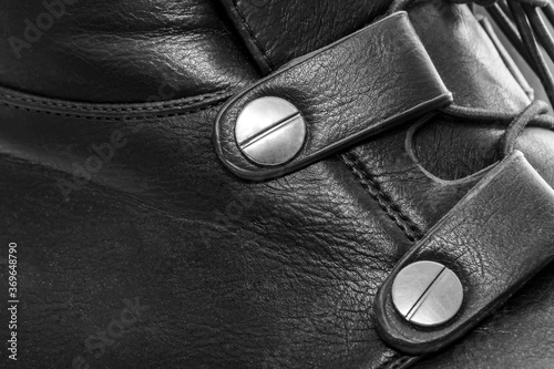  buckle on a black leather boot