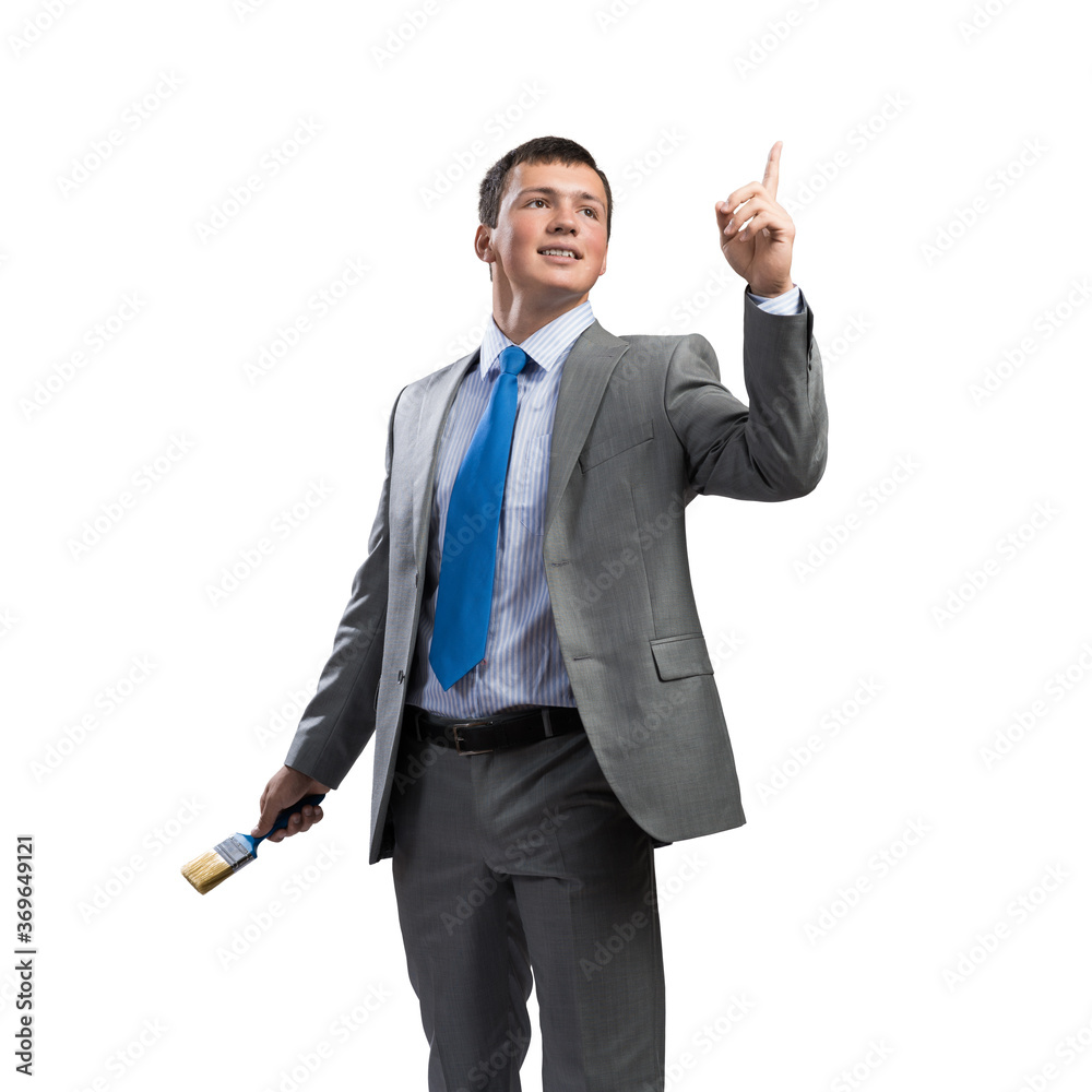 Creative businessman painter holding paintbrush Creative businessman painter holding paintbrush