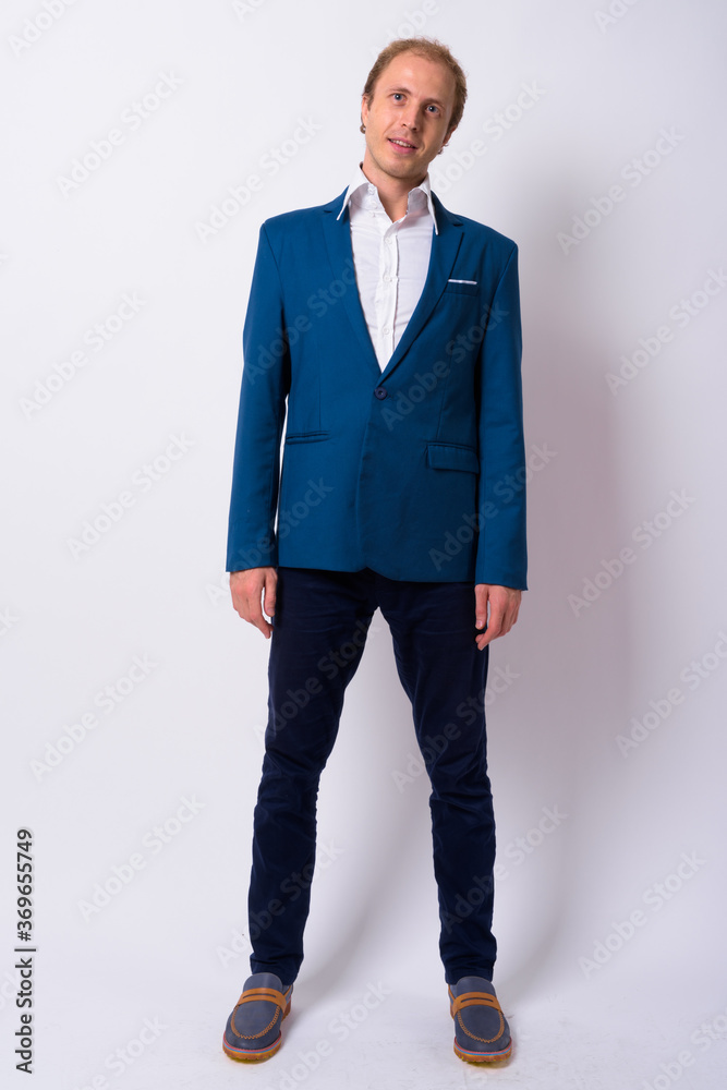 Portrait of happy businessman with blond hair in suit Portrait of happy businessman with blond hair in suit
