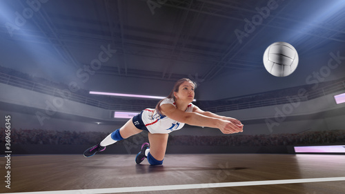 Photography Female professional volleyball players in action on 3d stadium.