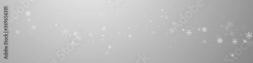 Sparse snowfall Christmas background. Subtle flyin