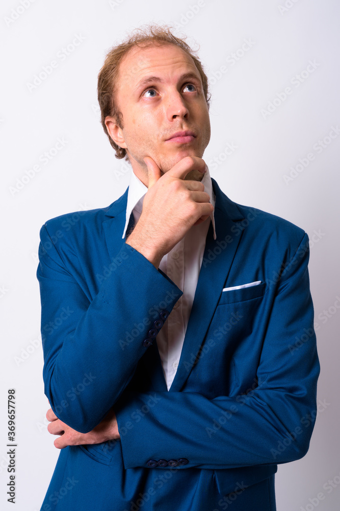 Portrait of businessman with blond hair in suit Portrait of businessman with blond hair in suit