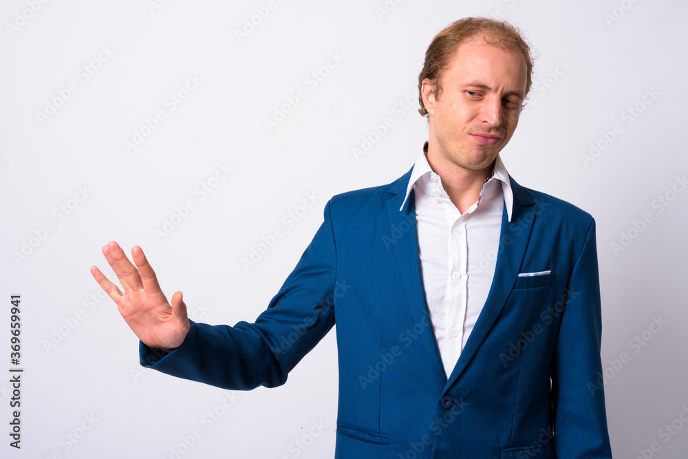 Portrait of businessman with blond hair in suit Portrait of businessman with blond hair in suit
