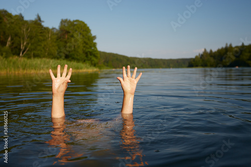 danger of drowning in a lake in summer photo