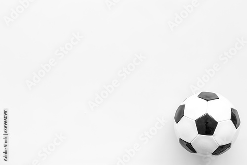 Fototapeta Naklejka Na Ścianę i Meble -  Football ball on white background top view copy space