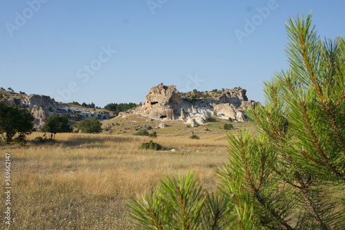 Historic rock formations and caves at anatolia photo