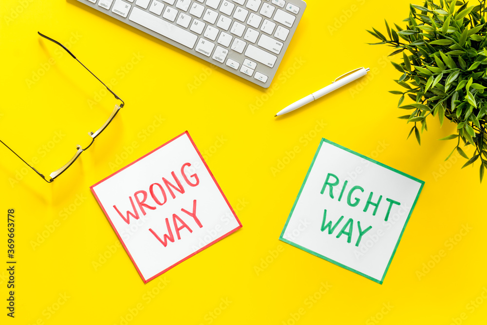 Problem solving. Right and wrong way icons on work desk from above Problem solving. Right and wrong way icons on work desk from above