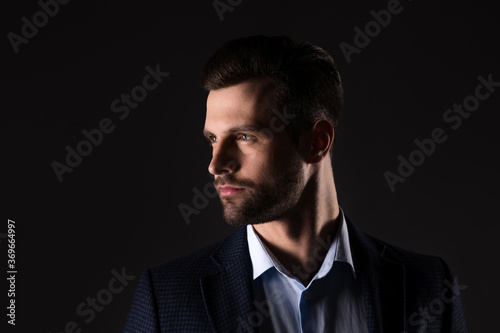 Close-up portrait of his he nice attractive content chic classy corporate employee man banker agent broker financier wearing jacket isolated over dark black color background