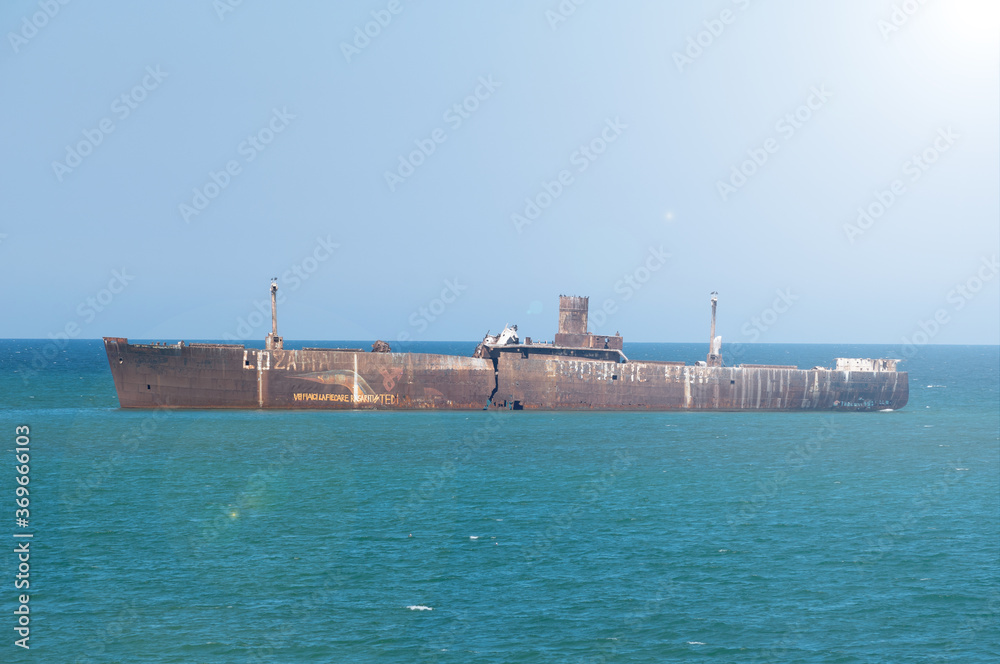 Fototapeta premium A shipwreck. An old wreck abandoned at sea. The wreck of the ship