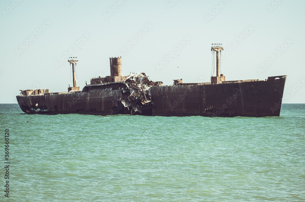 A shipwreck. An old wreck abandoned at sea. The wreck of the ship A shipwreck. An old wreck abandoned at sea. The wreck of the ship