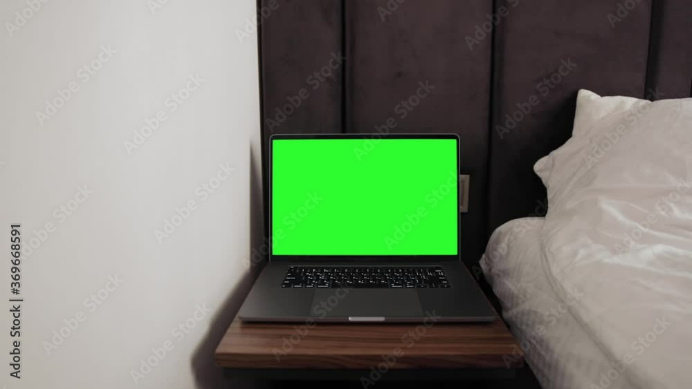 Close up shot of modern chroma key green screen MacBook Pro 16 inch