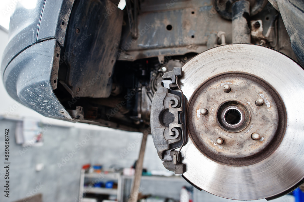 Car brakes repair and maintenance theme.