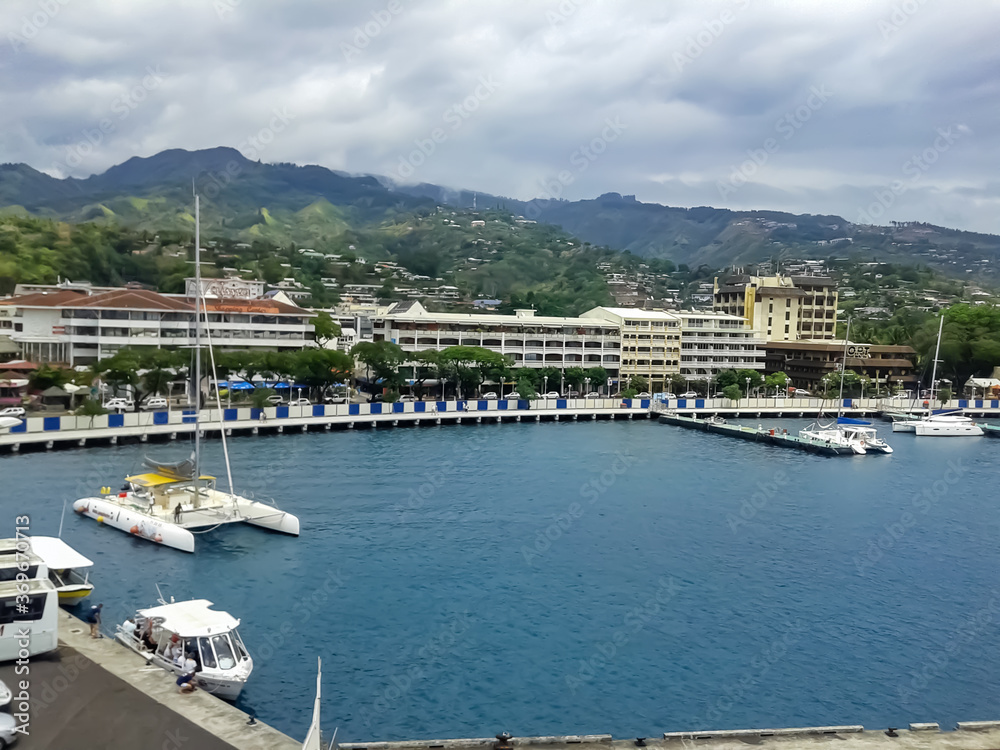 9/28/2014 papeete ,french polynesia, a view of pier ,mountains and building
