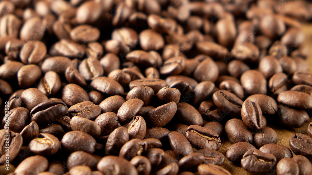 Roasted coffee beans with background. Roasted coffee beans with background.