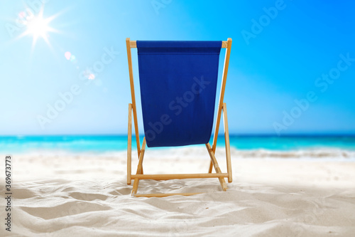 Fototapeta Naklejka Na Ścianę i Meble -  Summer chair with beach and free space for your decoration. 