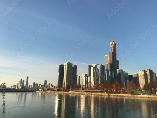 Downtown Chicago skyline with reflections on the Michigan lake. Early morning. Chicago  Illinois  United States.