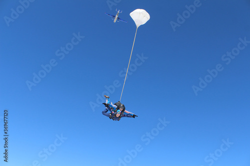 Skydiving. Two guys are flying and having fun in the sky.