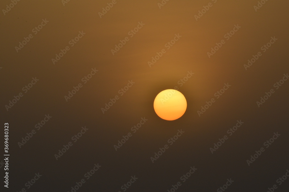 A view of sunset from Baniyas,Abu Dhabi.Golden color dramatic sky.