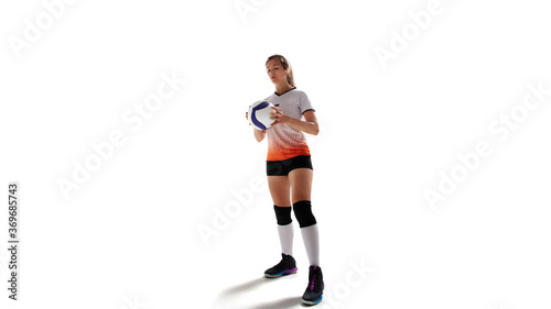 Female professional volleyball players in action on white background. © VIAR PRO studio
