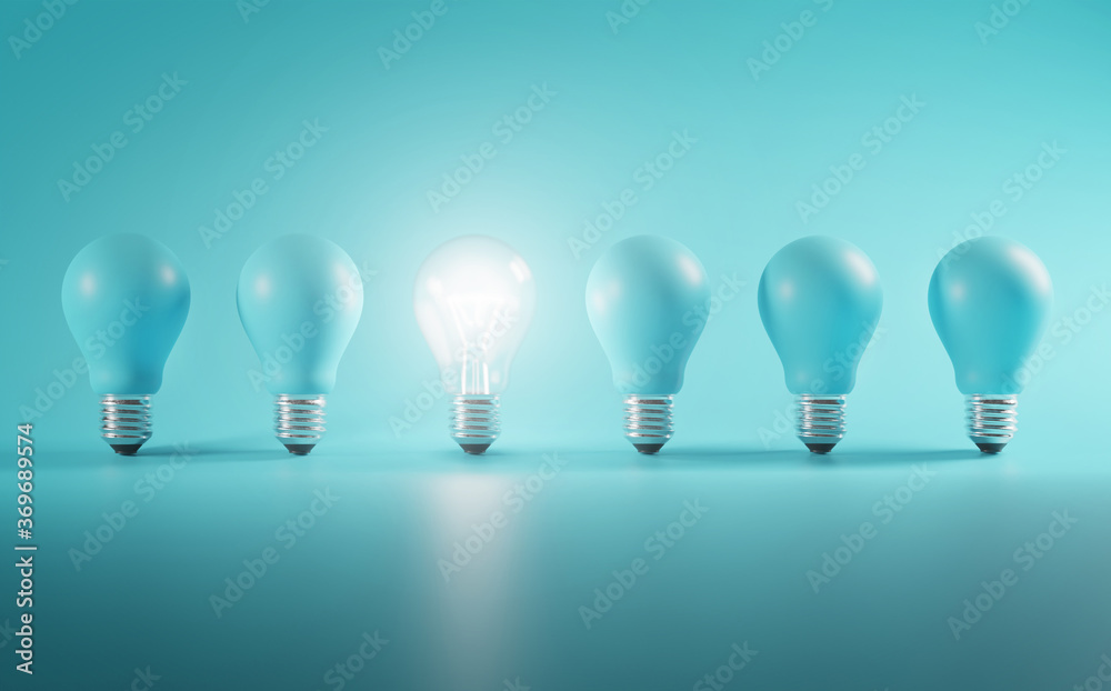 Outstanding Idea Concept. Glowing Bulb Between Unlit Blue Bulbs Minimal. Outstanding Idea Concept. Glowing Bulb Between Unlit Blue Bulbs Minimal.