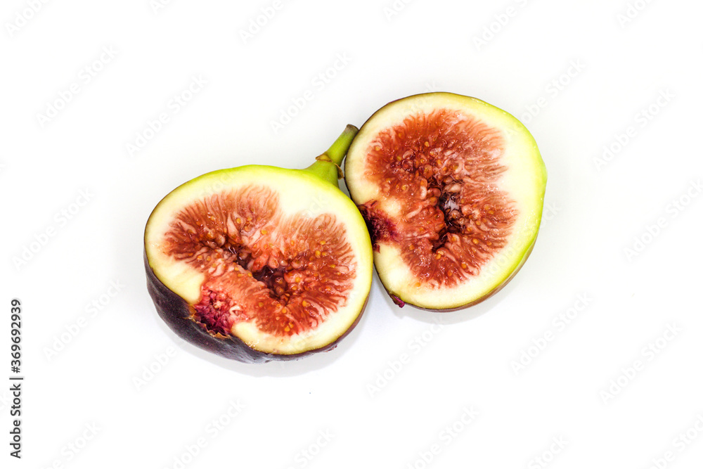 Fresh Brown turkey figs Half of fruit isolated on white background. Fresh Brown turkey figs Half of fruit isolated on white background.