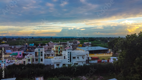 Aerial view of golden sunset in landscape © Neha