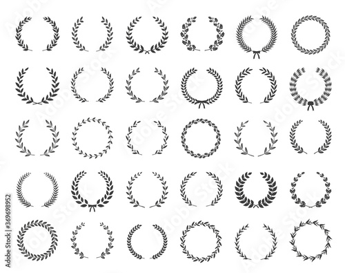 Big collection of thirty different black and white silhouette circular laurel foliate and oak wreaths depicting an award, achievement, heraldry, nobility. Vector illustration.