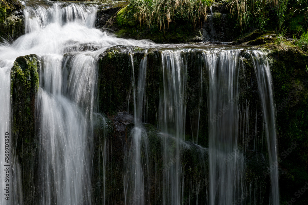Obraz premium longexposure of a waterfall at Griessbach Falls in Berner Oberland