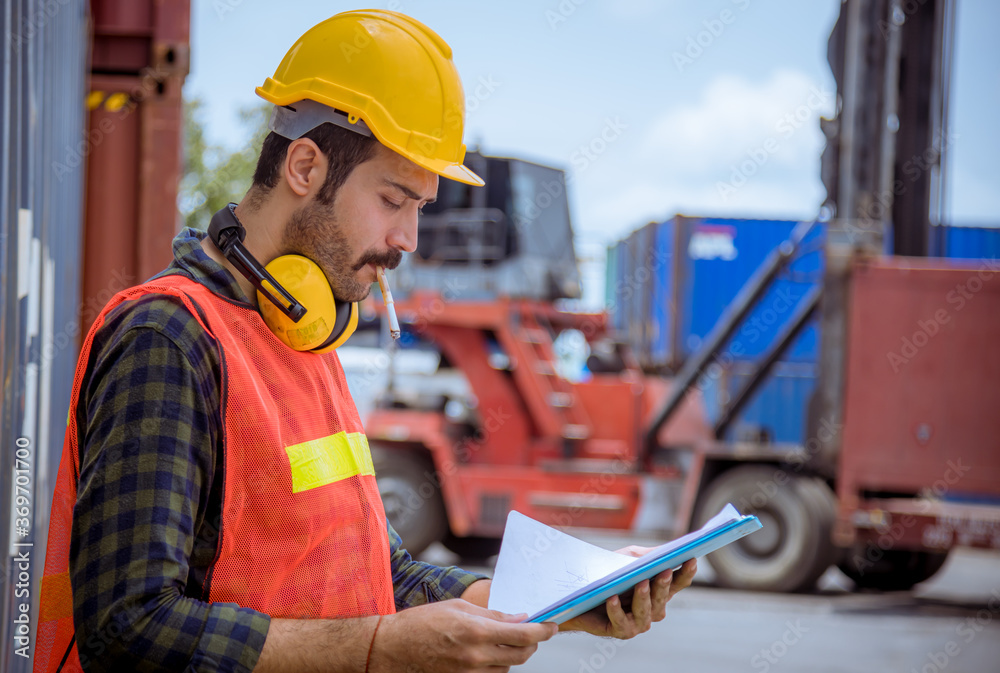 Portrait Dock Worker Under Working And Checking Production Process On portrait-dock-worker-under-working-and-checking-production-process-on