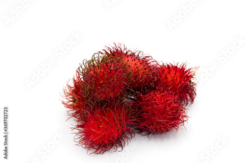 Fresh and sweet delicious red ripe Rambutan isolated on white background.