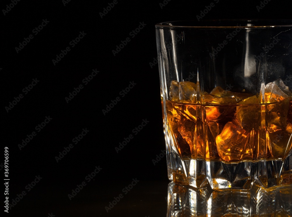 Glass of Whiskey and Ice Glass of Whiskey and Ice