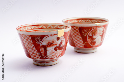 Canvas Print Japanese kintsugi ceramic sake cup, restored with real gold