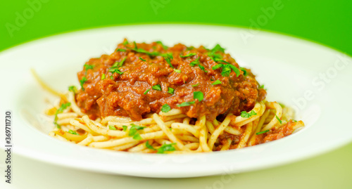 Minced beef bolognese with onions and carrots served with spaghetti