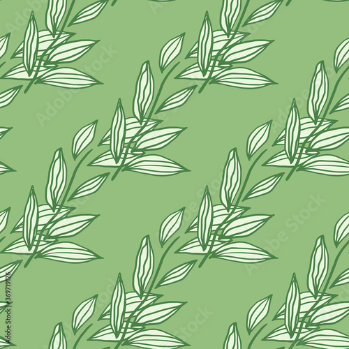 Pastel seamless doodle pattern with foliage contoured shapes. White floral outline ornament on light green background.