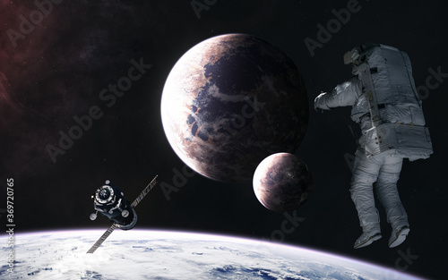 Fototapeta Naklejka Na Ścianę i Meble -  Astronaut, space station orbiting planet in deep space. Science fiction. Elements of this image furnished by NASA