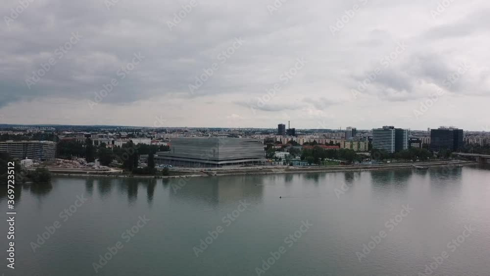Aerial flyover Danube river with Budapest city skyline and Duna Arena in background,Hungary Aerial flyover Danube river with Budapest city skyline and Duna Arena in background,Hungary