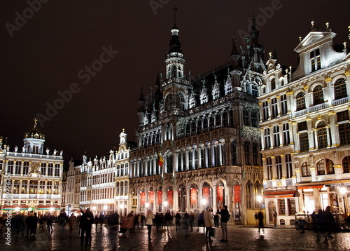 Night shot of illuminated facades on the Grand Place or Square also used in English or Grote Markt that is the central square of Brussels.