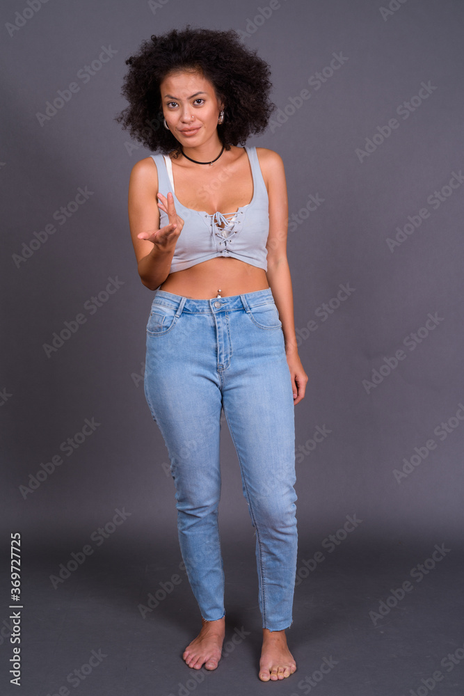 Young beautiful African woman with Afro hair Young beautiful African woman with Afro hair
