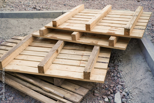 Close-up old wooden pallets.Wood pallet in factory area use for carry material and product supply to customers.