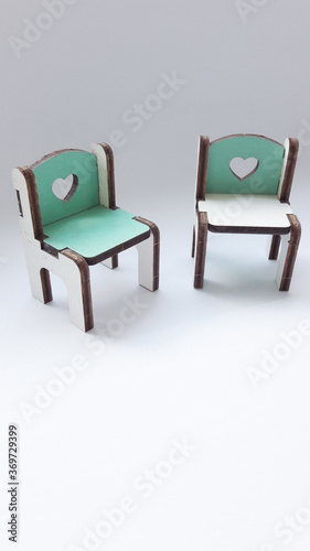 green armchair with a white background