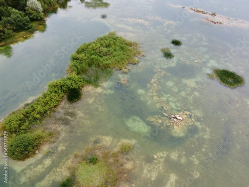 Old flooded sand pit aerial photo photo