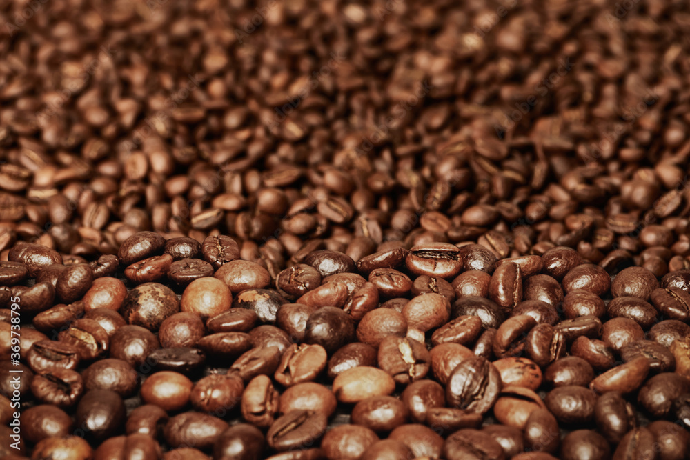 Fototapeta premium Roasted coffee beans background. May use for banner 